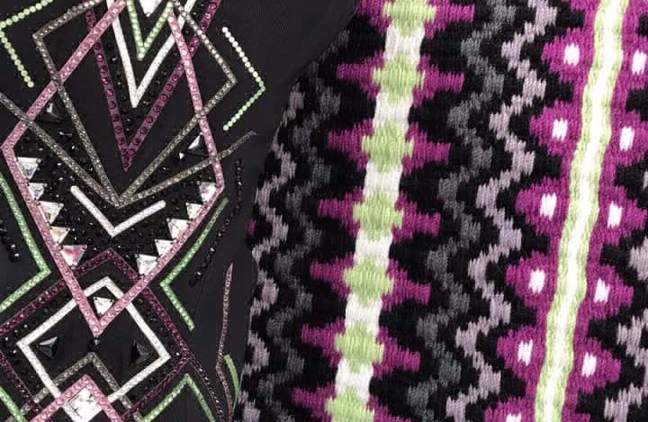Close up of a colour matched saddle blanket with matching riding vest