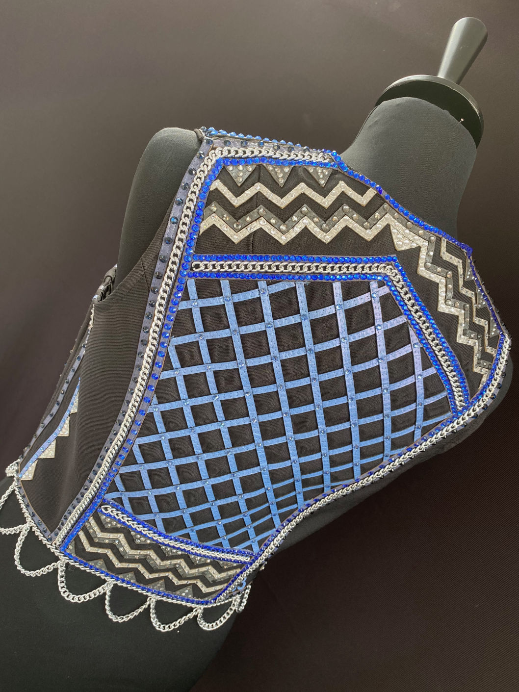 For Sale: Blue, grey, sliver and Black Vest detailed with leather, chain and crystals 